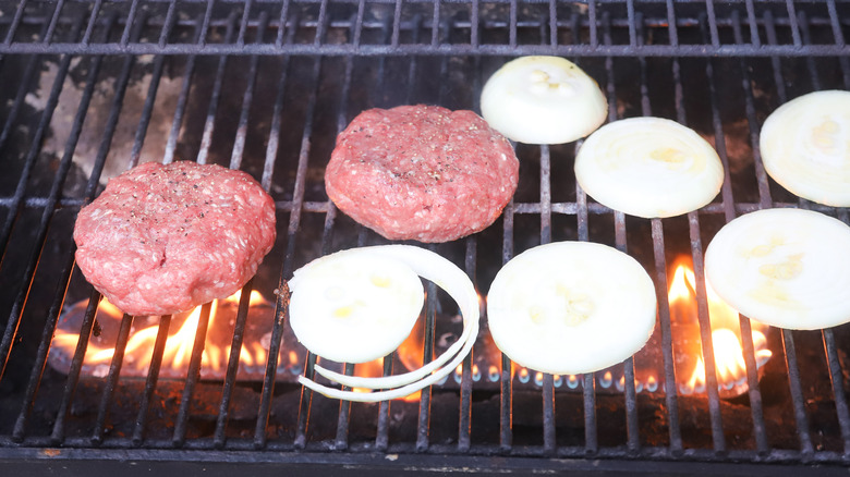 Burgers cooking on grill
