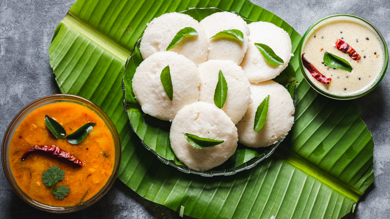 Idli with lentil sambar and coconut chutney