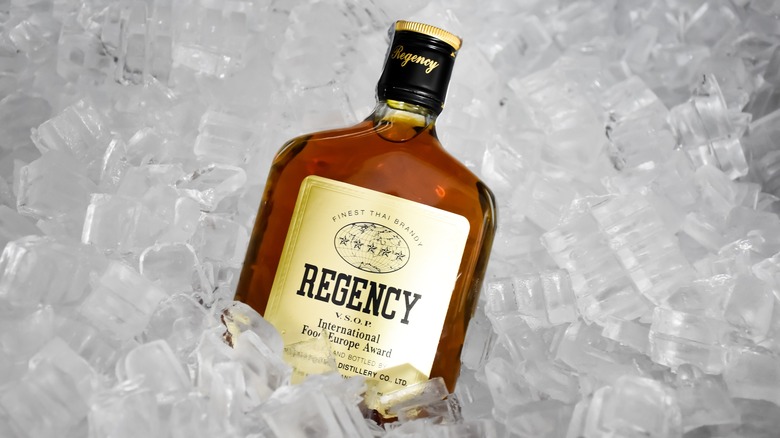 Bottle of brandy on ice