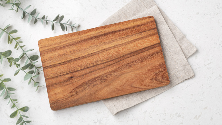 cutting board on kitchen towel