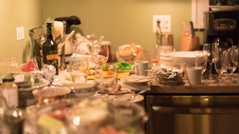 Dish clutter on kitchen counter