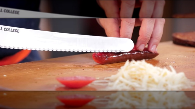 Kool-Aid soaked pickles being sliced