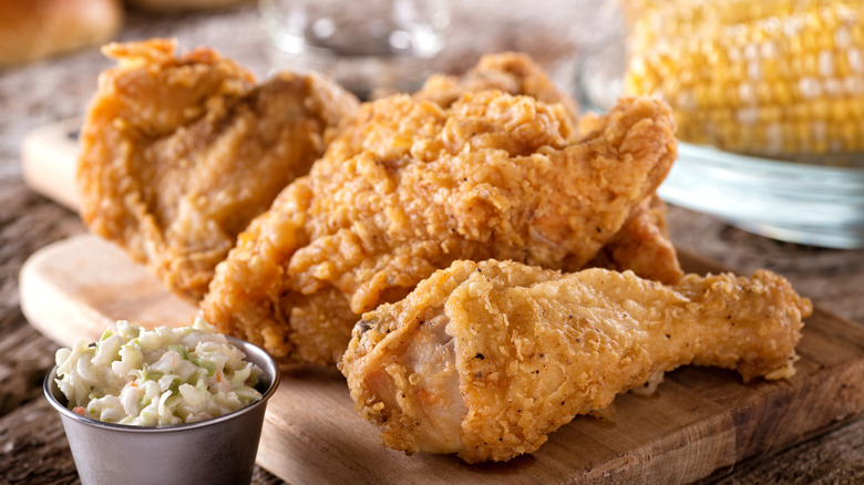 Southern style fried chicken with coleslaw and corn on the cob