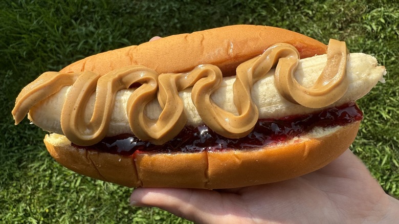 Banana with peanut butter in hot dog bun