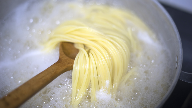 boiled water used for cooking spaghetti