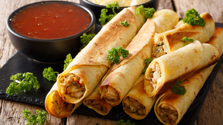 Chicken flautas with red salsa