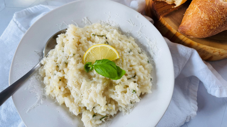 lemon basil risotto with baguette bread in basket