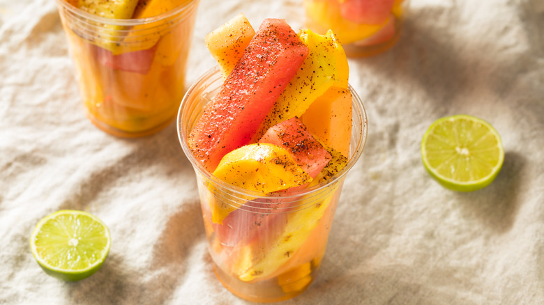 Mango and watermelon fruit cup with Tajin and lime