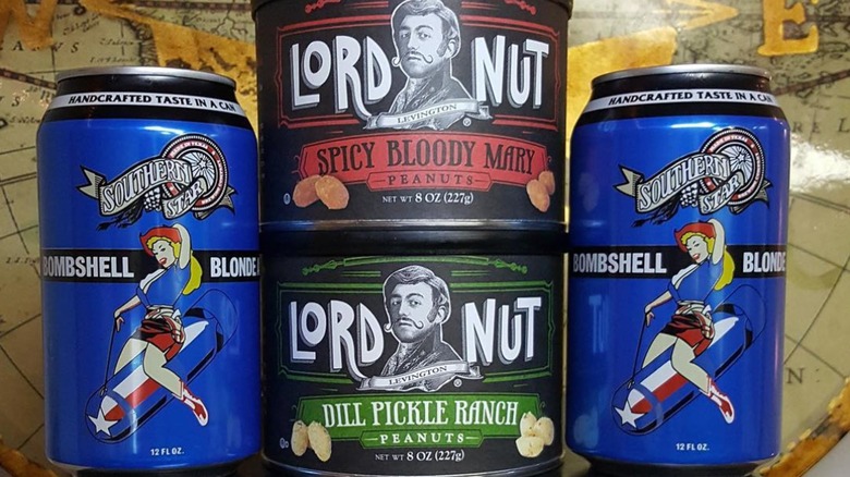 Two cans of Lord Nut peanuts with craft beer