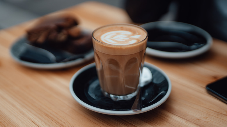 A glass of flat white