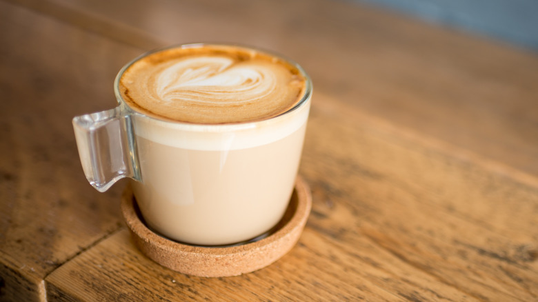 flat white in glass mug