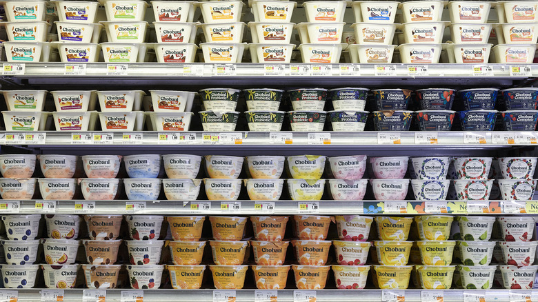 aisle of yogurt cups in grocery store