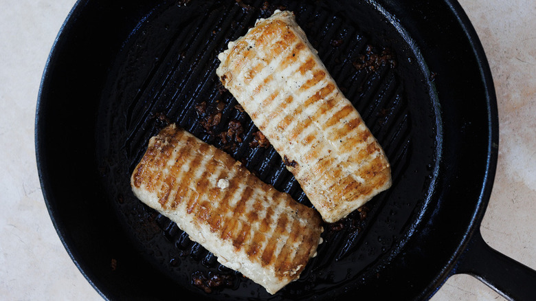 Grilled fish in pan