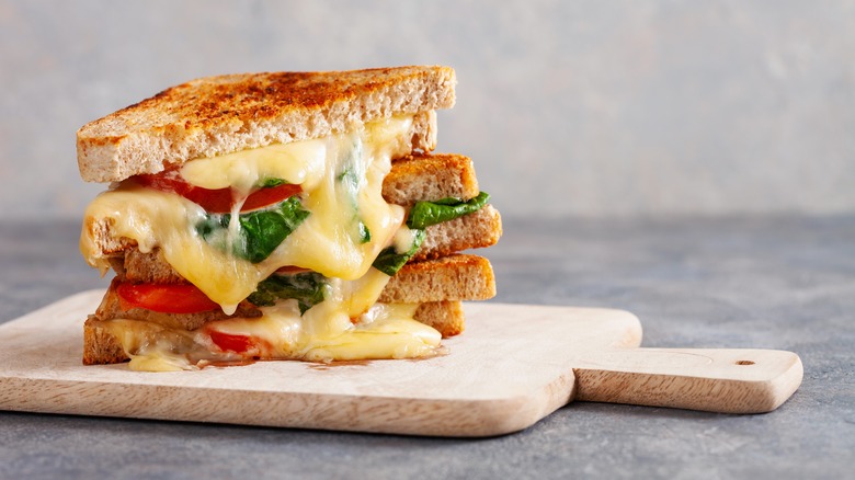 Grilled cheese with tomato and greens