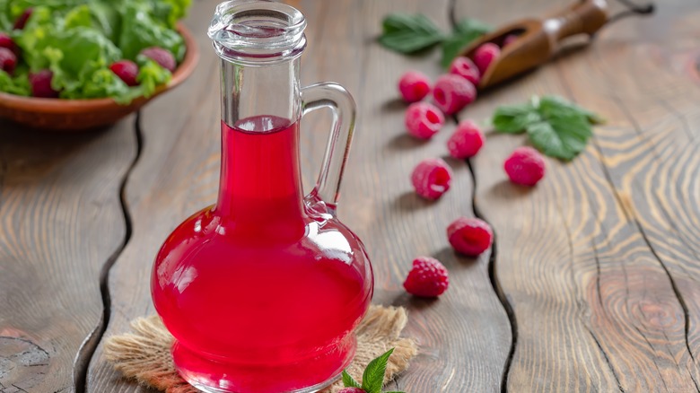 red syrup in glass jar