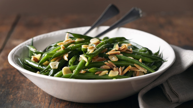 Garlic green beans in a white bowl