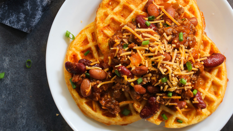 Cornbread waffles topped with beans and cheese