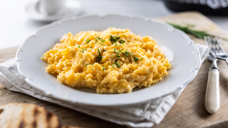 Scrambled eggs in a white dish