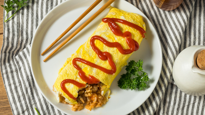 Japanese omelet on plate with chopsticks