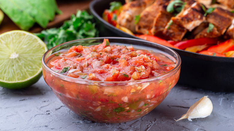 salsa bowl with lime and garlic