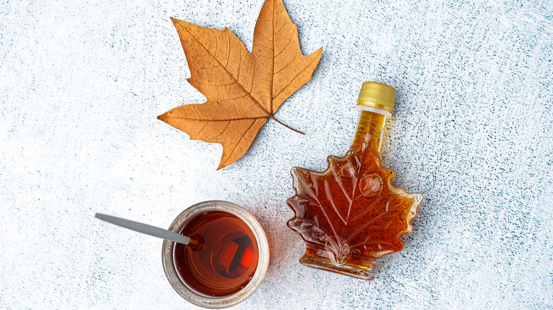 maple syrup in ramekin and bottle