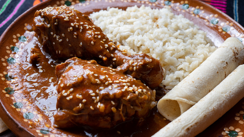chicken mole with rice and tortillas