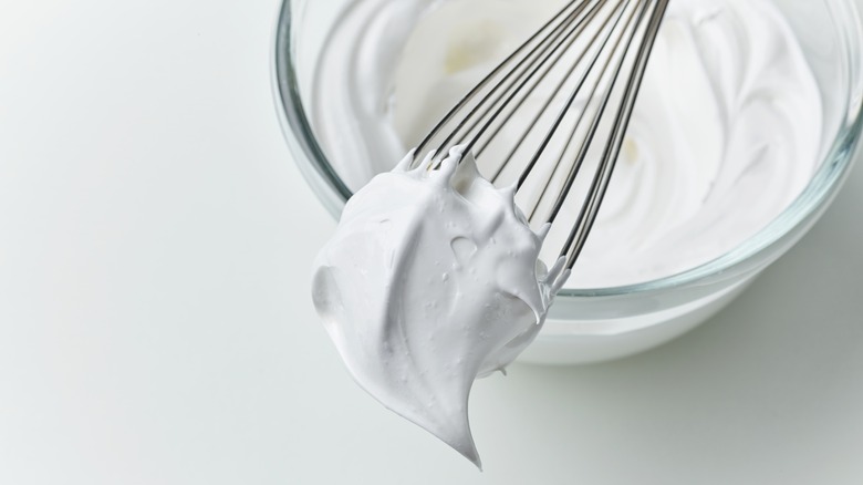 Whipped cream bowl with whisk