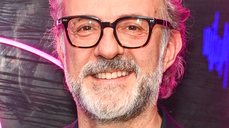 Massimo Bottura in glasses and smiling at event