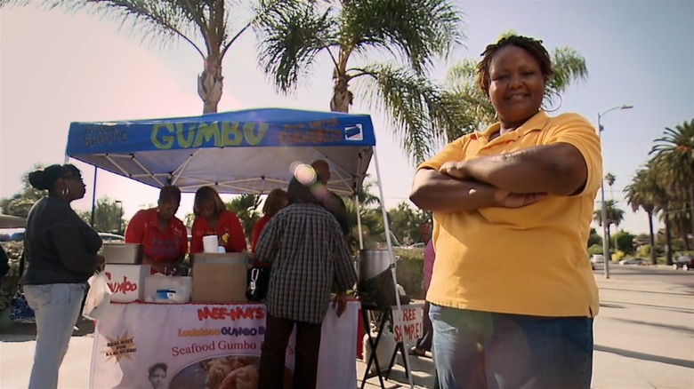 Carole Foster selling gumbo outdoors