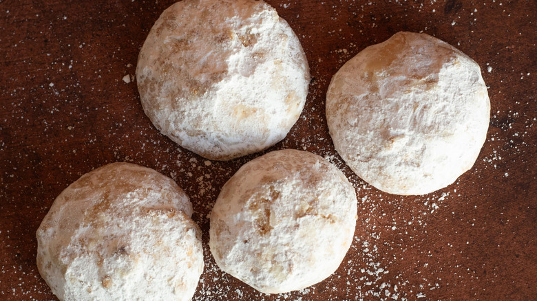 overhead view of Mexican wedding cookies covered in powdered sugar