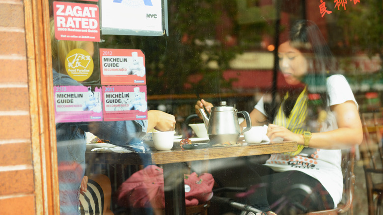 Restaurant window with Michelin stickers