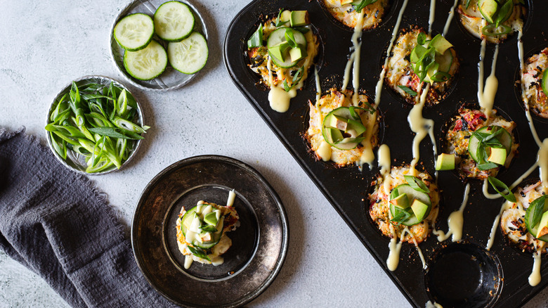 Mini sushi bake muffins in a tin and on a plate