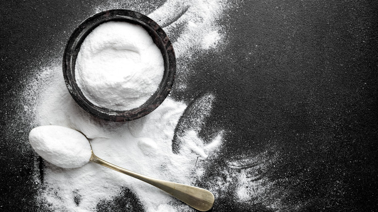 baking soda in bowl with spoon
