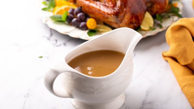 gravy and turkey on counter