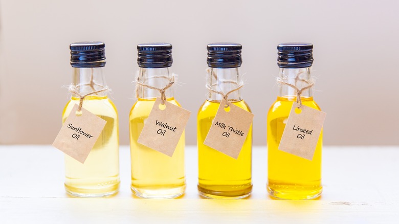 Four bottles of different oils