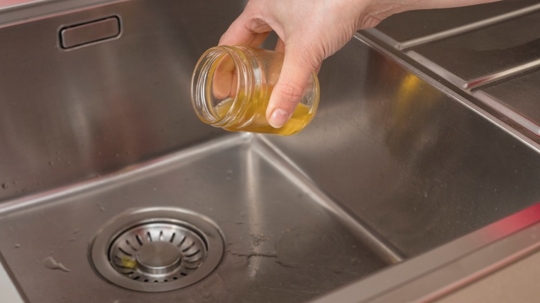 Pouring cooking oil down the sink