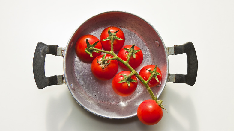 Vine tomatoes in aluminum pan