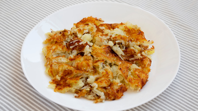 hash browns on a white plate