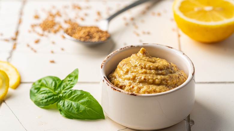 mustard in white ramekin