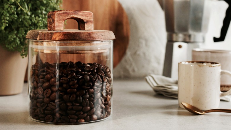 Glass jar filled with coffee beans