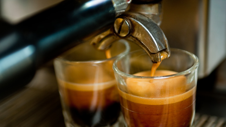 Two espresso shots being poured