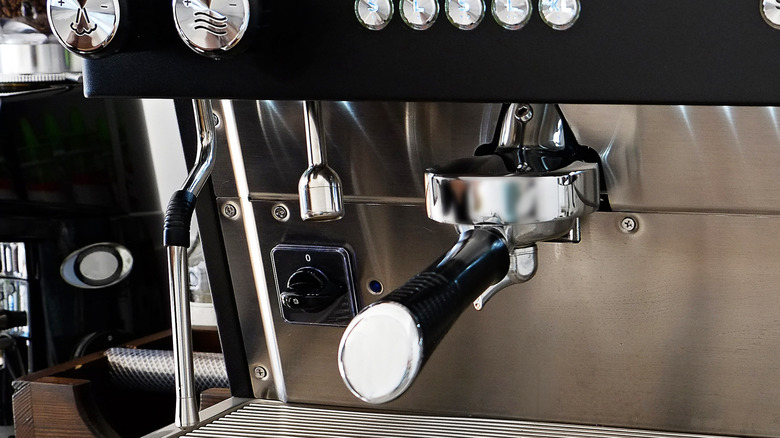 Group handle locked into a coffee machine