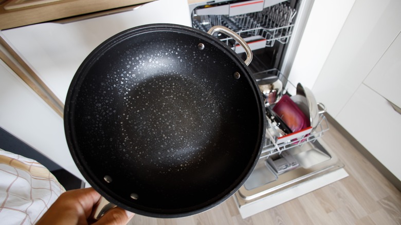 non-stick pan in front of dishwasher