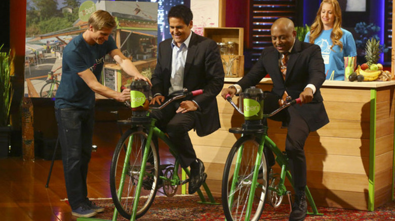 Daymond John and Mark Cuban ride blender-bikes on Shark Tank