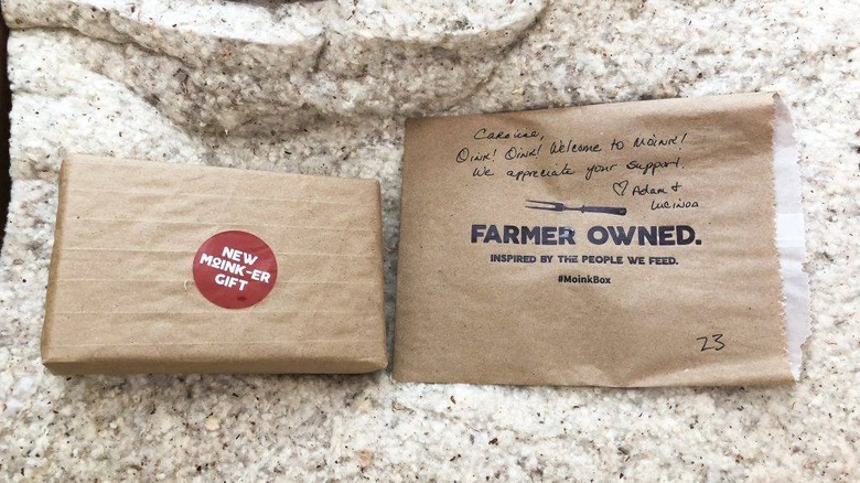 A box of Moink with gift and farmer note