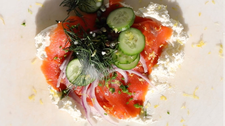 Lox, cream cheese, red onion, cucumber, dill, and capers