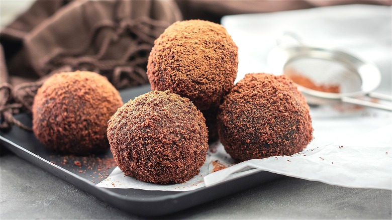 Chocolate dessert balls covered in cocoa powder