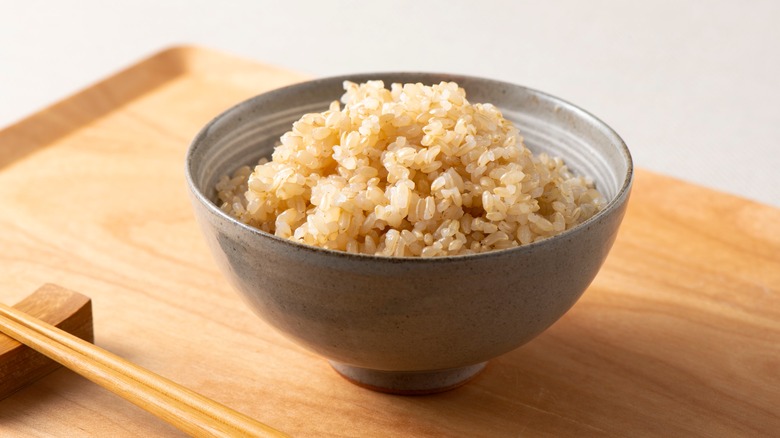 Bowl of brown rice in gray bowl