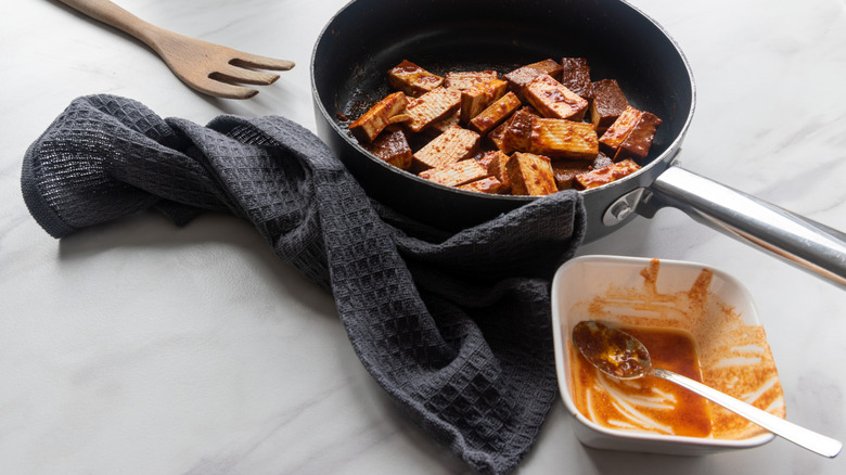 tofu in pan with Asian style marinade