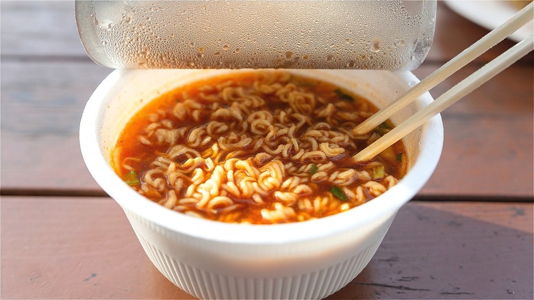 Prepared bowl of instant ramen with chopsticks